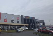 Reclama Action pe OK Shopping Center: un semn că Bistrița va avea un magazin cu potențial de succes